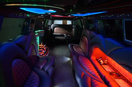 dark bus interior with laser lights